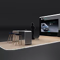 Modern Exhibition Booth Setup With Display Screen Person And Blue Stools 3d model