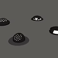 Black Round Lighting Fixtures with Different Patterns and Illuminated Details on Gray Surface