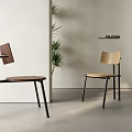 Modern Wooden Leisure Chairs With Black Metal Legs In Minimalist Room With Green Plant
