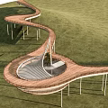 Scenic Winding Wooden Pathway With Supporting Pillars And Circular Rest Area On Green Hillside