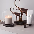 Elegant Perfume Cosmetics With Glass Bottles Gold Accents Skincare Products And Scented Candle