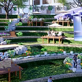 Scenic Park Landscape With Terraced Green Areas Wooden Platforms And Relaxing Seating