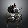 Brass Bar Cart With Wine Bottles Shakers And Glasses On Metal Shelves