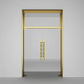 Modern Gold Framed Swing Door With Clear Glass Panel And Decorative Handles
