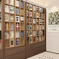 Wooden Bookshelf Filled With Various Colorful Book Spines And Art Prints