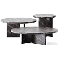 Three Modern Round Marble Coffee Tables With Sleek Base Design 3d model