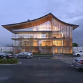 Modern Office Building With Unique Roof Design Glass Curtain Walls Illuminated Interior And Parking Area