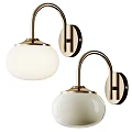 Modern Wall Lamps With White Globe Shades And Brass H Shaped Mounting Frames