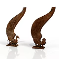 Two Brown Wing Shaped Carved Wooden Decorative Items With Bird Shaped Base