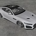 White Jaguar Sports Car With Modern Sleek Exterior In Gray Indoor Space