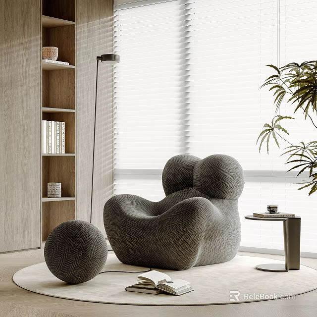 Stylish Gray Accent Chair With Unique Design Small Round Ottoman Floor Lamp And Potted Plant 3d model