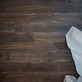 Dark Oak Wood Flooring With Natural Grain And Smooth Rich Texture Surface