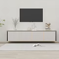 Modern TV Stand With Wall Mounted TV Decorative Items And Green Plants On Wooden Floor