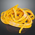 Yellow Striped Long Pasta Noodles Stacked in Twisted Pile on Dark Background