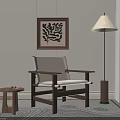 Comfortable Wooden Frame Lounge Chair With White Cushion Side Table Floor Lamp And Decorative Painting