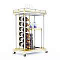 Golden Bar Cart With Wine Glasses Bottles Drinks And Wheels On Shelves