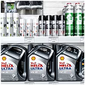 Neatly Arranged Retail Display Shelves Holding Cleaning Products Tools And Lubricant Bottles