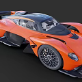 Orange Racing Sports Car With Aerodynamic Features And Sleek Body
