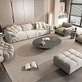 Modern Beige Sofa And Round Coffee Table Set With Plush Cushions Ottoman And Woven Rug