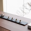 Elegant Tea Set with Teapot and Cups on Wooden Tabletop Window Bare Branch Decoration