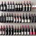 Colorful Wine Bottles And Glasses Arranged In Neat Rows With Assorted Shapes And Sizes