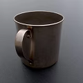 Elegant Metallic Mug With Shiny Silver Finish And Sturdy Handle Design