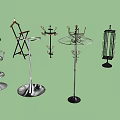 Various Stylish Metal Clothes Hangers With Decorative Designs And Floor Stand Bases