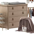 Wooden Chest of Drawers in Baby Nursery with Hanging Clothes and Decorative Paintings