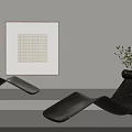 Modern Sculptural Chaise Lounge in Minimalist Interior with Framed Art and Potted Plant