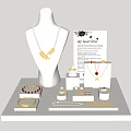 Elegant Jewelry Display With Gold Necklace Rings Bracelets And Earrings On Stand