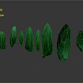 Green Crystals in Various Shapes with Glossy Surface on Gray Background