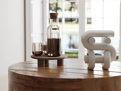 White Abstract Inflatable Model on Wooden Round Table with Brown Bottle and Small Glass Cups 3d model