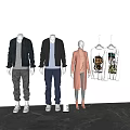 Mannequins Displaying Stylish Outfits With Black Gray Jackets Blue Jeans Pink Coat And White Tshirts