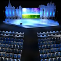 Blue Illuminated Stage Setup With Colorful Background Screen And Arranged Audience Seats
