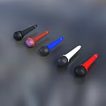 Modern Headphone Speakers in Black Red Blue White Colors Arranged on Gray Background