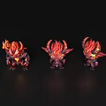 Three Cute Red Demon Game Characters With Flaming Horns And Different Poses