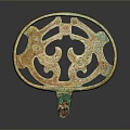 Ancient Chinese Bronze Circular Sculpture With Intricate Dragon Patterns And Green Patina Base Design
