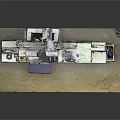 Industrial Processing Equipment With Green White Casing Control Knobs Pipes Yellow Stool And Platform