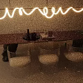 Elegant Golden Dining Table Set With Transparent Chairs White Cushions Marble Base And Curved Chandelier