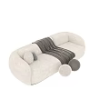 Modern Multi Seater Sofa in Neutral Tones with Cozy Blanket and Decorative Pillows