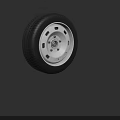 Car Wheel Featuring Black Rubber Tire And Silver Alloy Rim Design