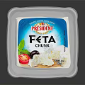 Kerry Feta Cheese Container Featuring Fresh Red Fruit And Green Leaf Accents