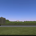 Multi Story Residential Building With Light Colored Exterior Windows Balconies And Green Surroundings