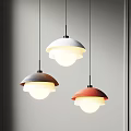 Modern Three Colored Dome Shaped Pendant Lights Hanging In Interior Space 3d model