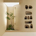 Indoor Landscape with Beige Walls Recessed Shelves Holding Black Teapots Green Plants and Small Tree