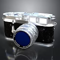 Vintage Electronic Camera With Silver Metal Body Blue Lens And Classic Design