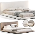Minimalist Modern Bed With Upholstered Headboard Neutral Pillows And Knit Blanket