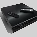 Modern Black Entertainment Media Player With Remote Control And Cassette Tape On Top