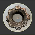 Intricate Ceramic Sculpture With Hollow Holes And Curved Textures On White Base