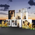 Elegant Wedding Photo Display With Multiple Cubes Flower Decorations And Sunset Background